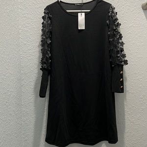 Black dress with sheer sleeves never worn